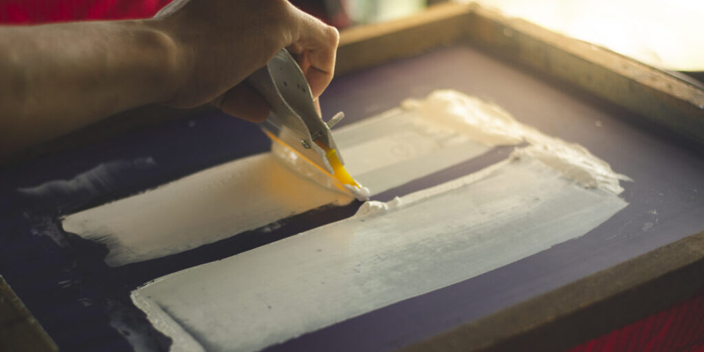 Red T-shirt Screen Printing, Is working finely, It's a very important step.
